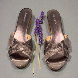 Authentic Jimmy Choo Mules with cork platform.